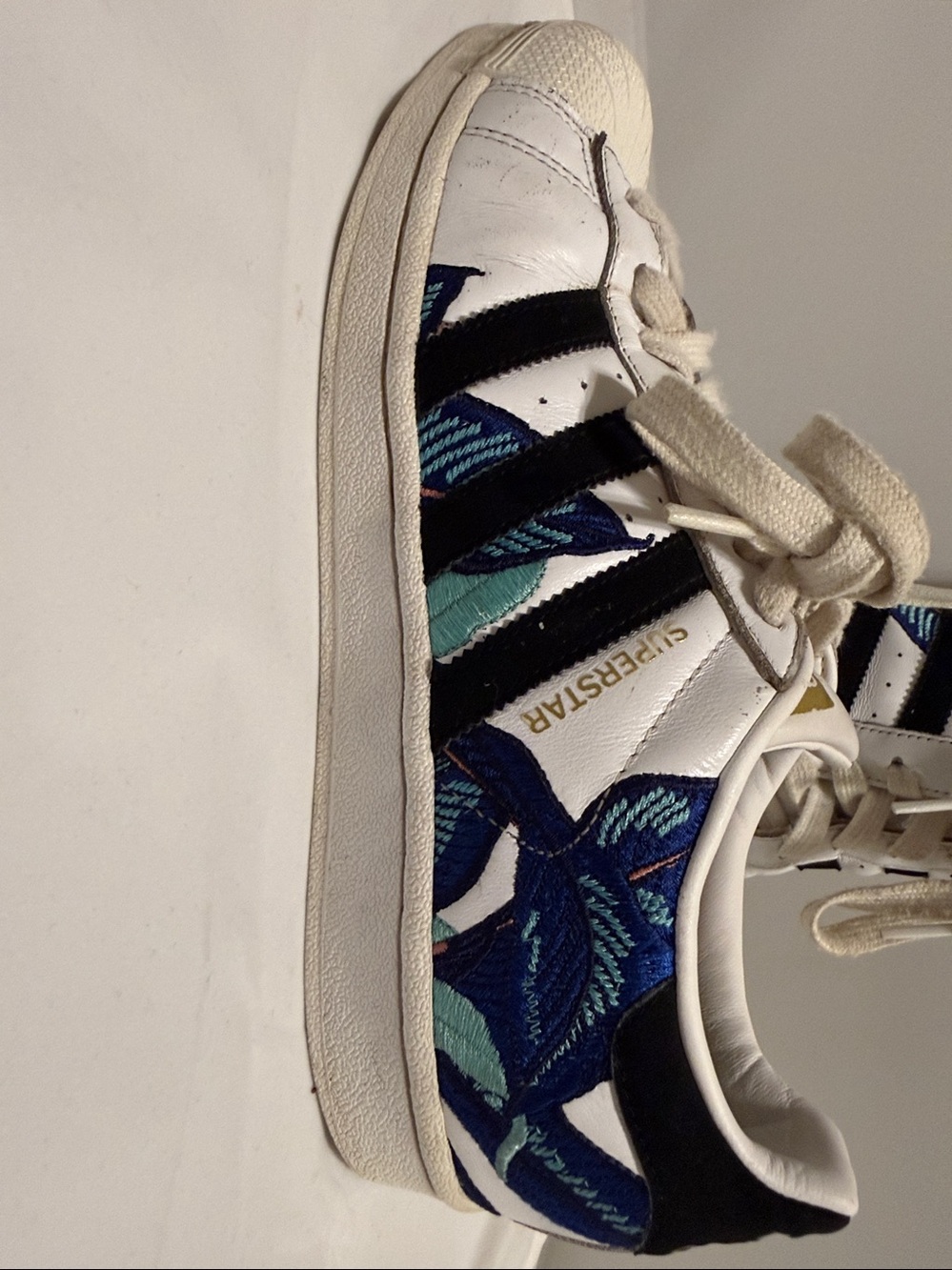 adidas White Sneakers with Black Stripes and Blue Floral Detail - Picture 2 of 5